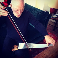 Birthday boy bowing his saw